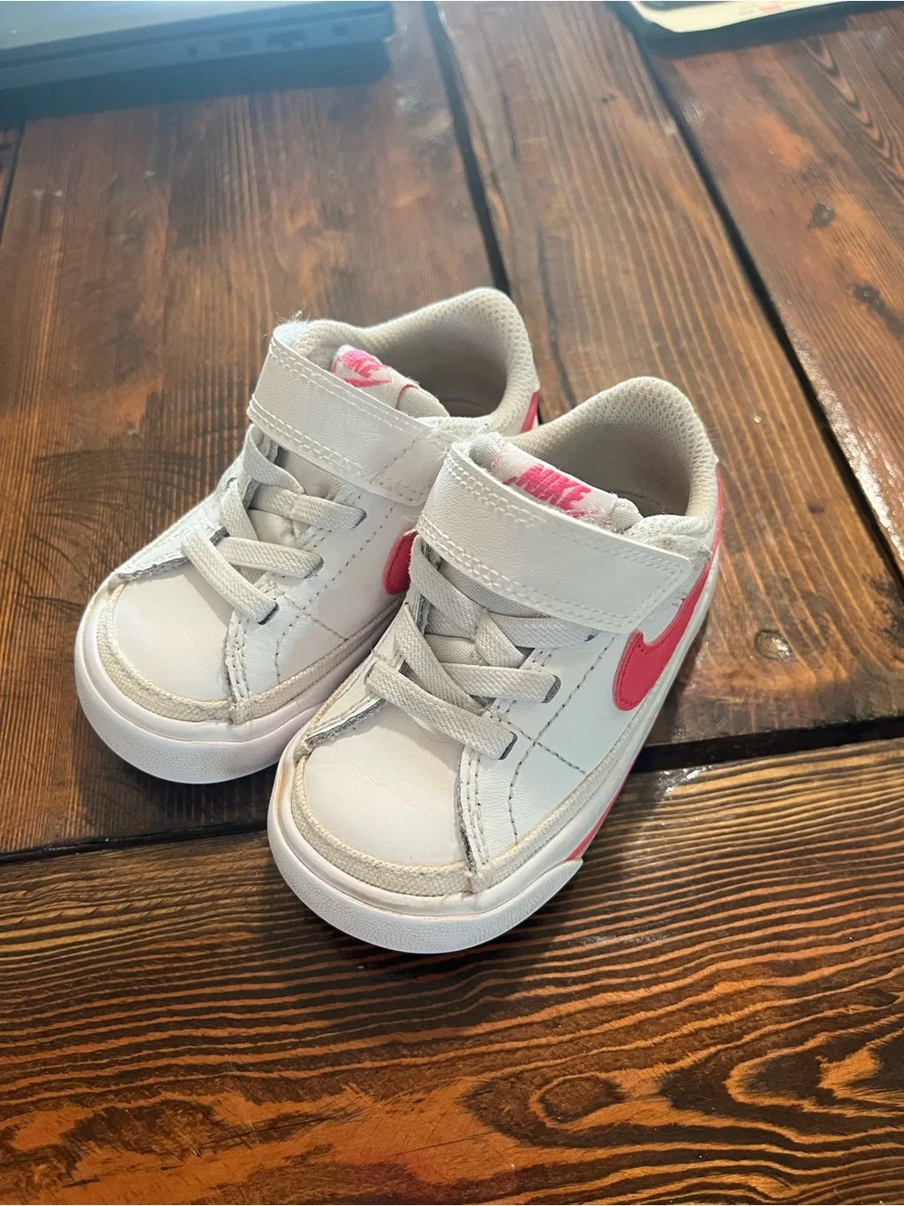 Nike Kids White Sneakers with Pink Swoosh and Pink Stripe